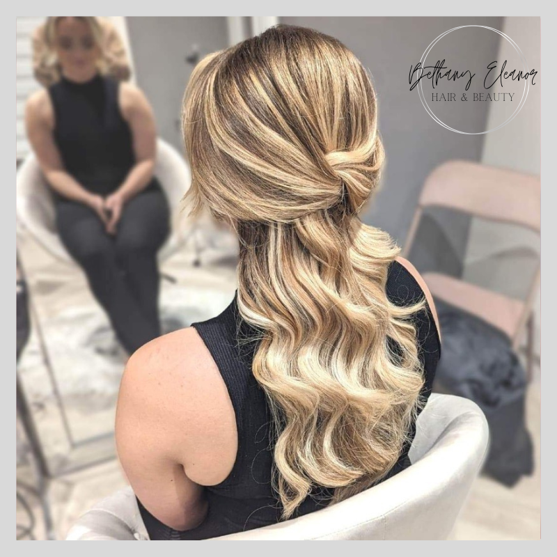 Image of bridal hair, delicate braided chignon at the base of the neck by Bethany Eleanor Hair & Beauty