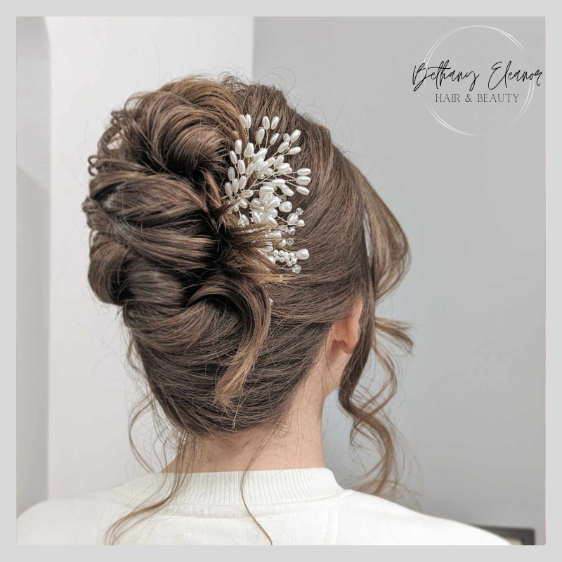 Image of bridal hair, curled and braided by Bethany Eleanor Hair & Beauty