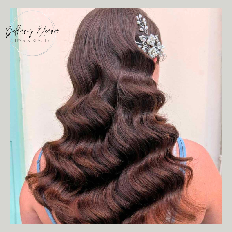 Image of bridal hair, curled and braided by Bethany Eleanor Hair & Beauty